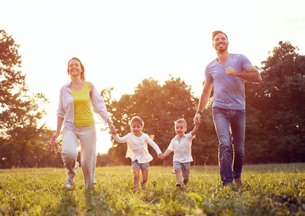 happy-family-running-on-grass-2